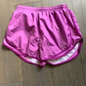 Purple Nike running shorts